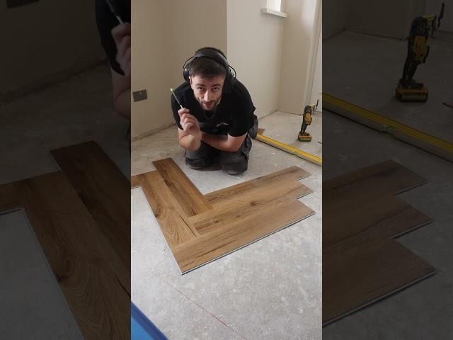 Laying herringbone LVT flooring