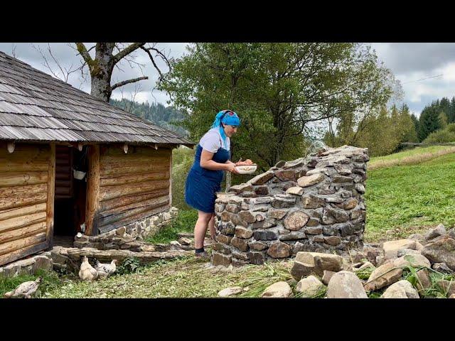 Life in a mountain village: lunch for builders at the end of the construction of wood