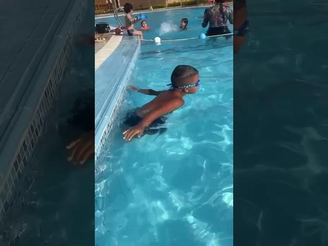 Leaning to swim on holiday #holiday #swimming #swimmingpool #kidsvideo #challenge