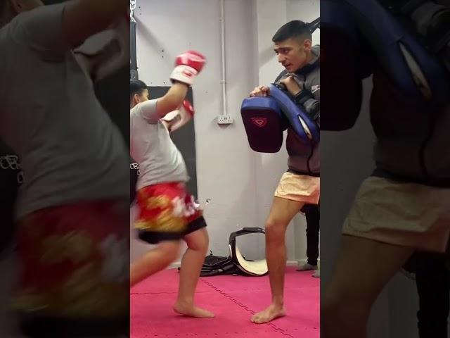 Abdullah kneeing with Mohammed Faizan