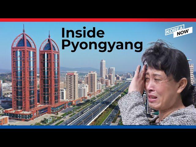 Tour of North Korea’s “new town” in Pyongyang with buildings shaped like missiles!