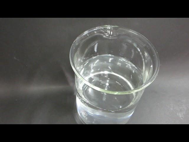 Sodium metal reacting with water in a beaker 1    MVI 1322