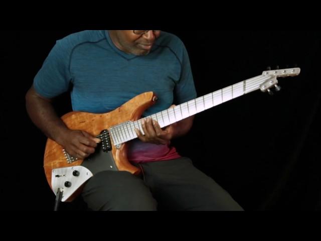 Ede Wright w Rick Toone Spearfish Redwood/Cedar guitar. Voices Carry