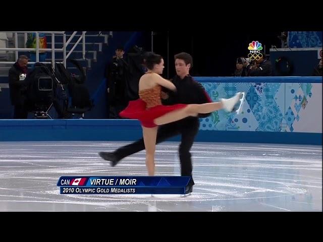 Tessa Virtue and Scott Moir kiss during Sochi 2014 FD warmup