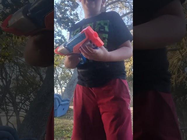 Shooting my new Nerf gun at things.