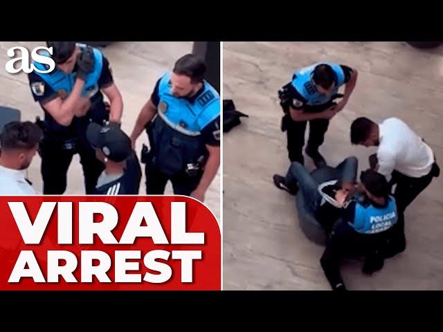 VIRAL ARREST: Two POLICE officers detain young man in SPAIN