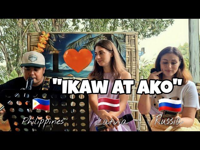 Pretty Russian and European Girls singing Tagalog song "Ikaw at ako" together with Filipino Guy