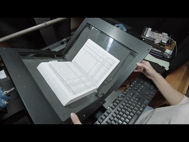 Eliza digitizing books at the Internet Archive