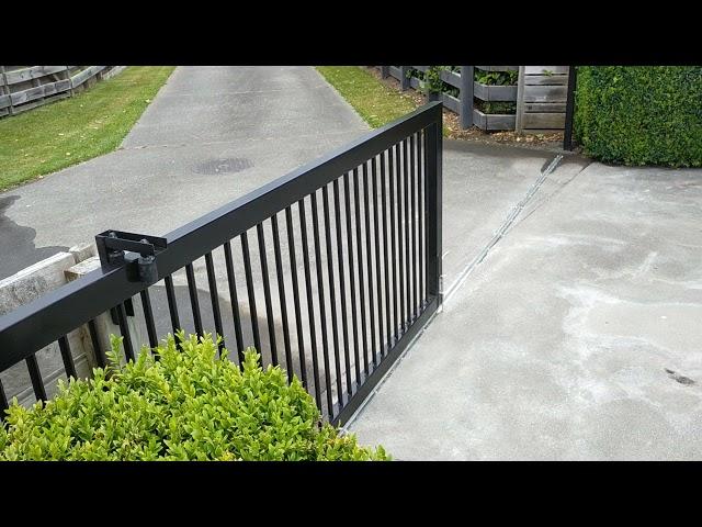 Premier Sliding Gate 1m high 6m wide. Uneven driveway.