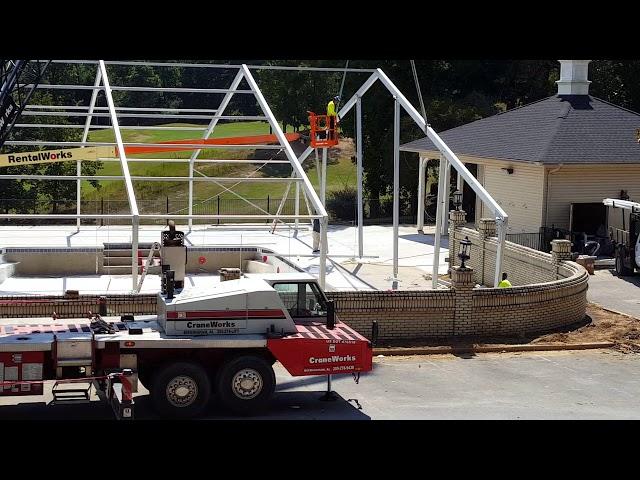 Losberger structure - flying in a 25m gable arch over a swimming pool