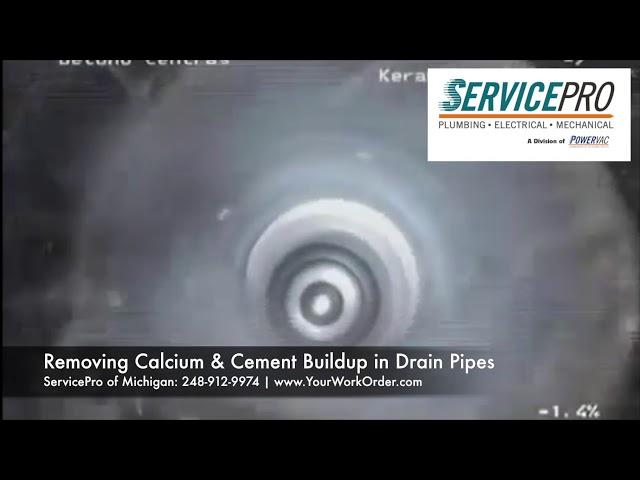 ServicePro | Removing Calcium & Cement Buildup in Drain Pipes