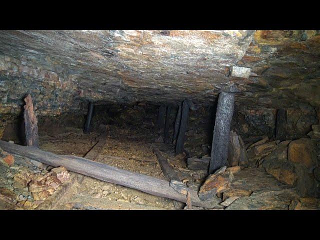 Sketchy Old Coal Mine with Iron & Wood Tracks Inside