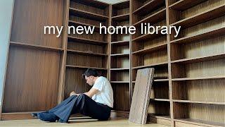 setting up my NEW dream home library for 1500+ books (it's bigger! and better!!)