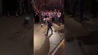 Person is doing a pizza tossing performance at a wedding!