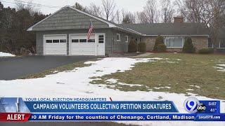 Campaign volunteers collecting petition signatures