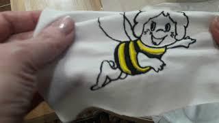 Tutorial on an embroidery machine on elastic fabric for a T-shirt. Part 3