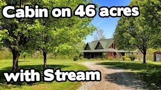 Artist Retreat Log Cabin style home on 46 acres, Barn and Creek