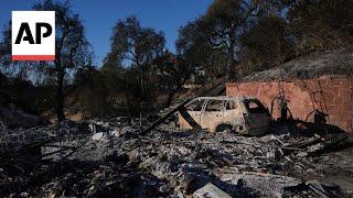 Some Southern California residents return to their homes burned in wildfire