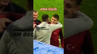 Georgian official hugs Arda Güler at the end of the match