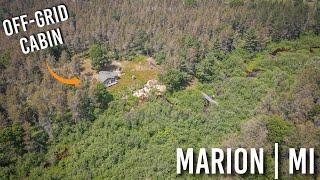 $119,000 | Waterfront Off-Grid Cabin | 20 Acres - Bringold Ave, Marion, MI - Century 21 Trophy Class