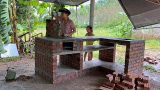 During the rainy and stormy days Yagi, I continued to build and perfect the wood stove