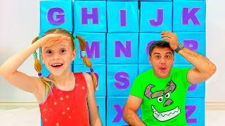 Nastya and dad are learning the alphabet