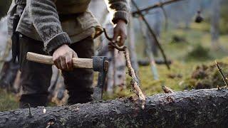 Bushcraft trip - natural shelter, drying meat, no sleeping bag, all night fire, homemade axe etc.