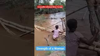 A mother escapes Narrowly from a Crocodile infested Congo River