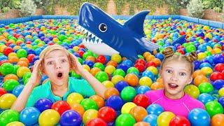 Kids found a shark in swimming pool with balloons