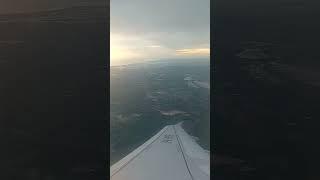 lihat sunset dari kabin pesawat