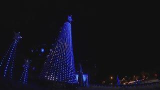 Cars in Conway line up in front of Christmas house light show