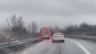 KSHB 41 reporter captures bus sliding on highway overpass