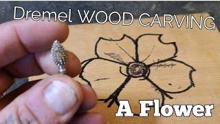 Power Wood carving a flower with  a dremel and kutzall carving bur.