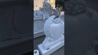 Hand carved marble angel headstone