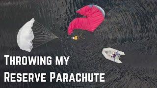 Paraglider RESERVE PARACHUTE Deployment over water