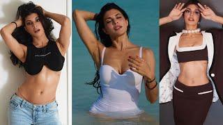 Jacqueline Fernandez Mesmerizing Modern Photoshoot Part 2 | Sultry White Swimsuit with straps Look