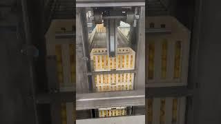Lemon storage tote de-stacker