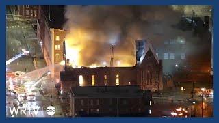 Fire crews battle downtown building blaze