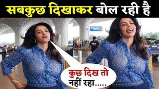 Mallika Sherawat spotted on Mumbai Airport in very bold Dress