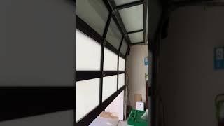 Fixing glass garage door off track