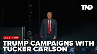 Donald Trump appears with Tucker Carlson in Glendale, Arizona