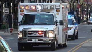 Chicago Police transporting with a Fire Department ambulance