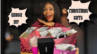 Chaotic Christmas gifts unboxing with kids.