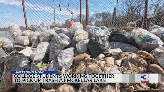 Hundreds of college students volunteer to clean up the McKellar Lake shoreline