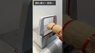 Strapping machine for small items