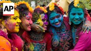 Holi festival celebrated with bursts of color across India