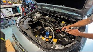 How to remove and charge a Subaru Impreza Battery with jumper cables