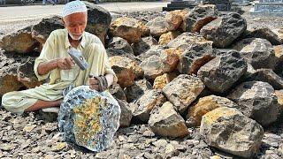 An 80-year-old man made a langi from granite mortar stone