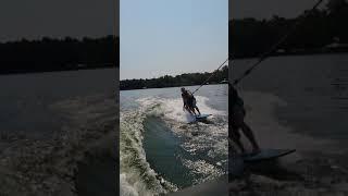 Owen wake surfing with daddy A