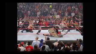 Bubba Ray Dudley powerbombs Torri Wilson through table